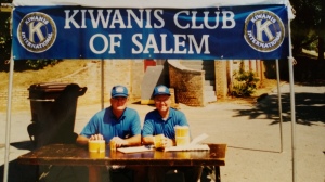 Salem Kiwanis booth with two of our members providing popcorn to the Easter Egg hunters.